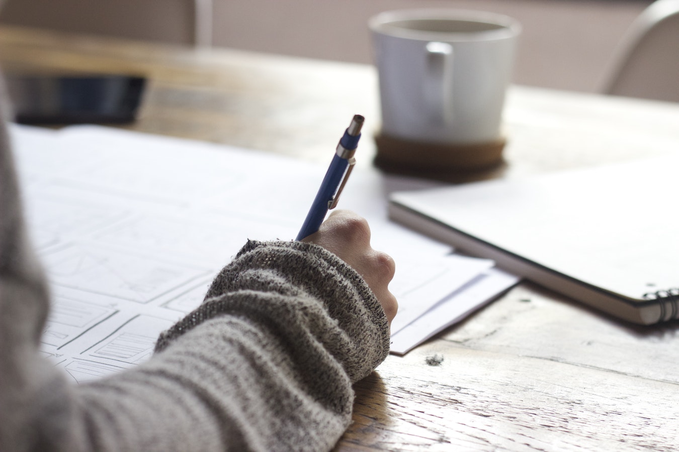 Pencil in a hand - Unsplash Moodshot