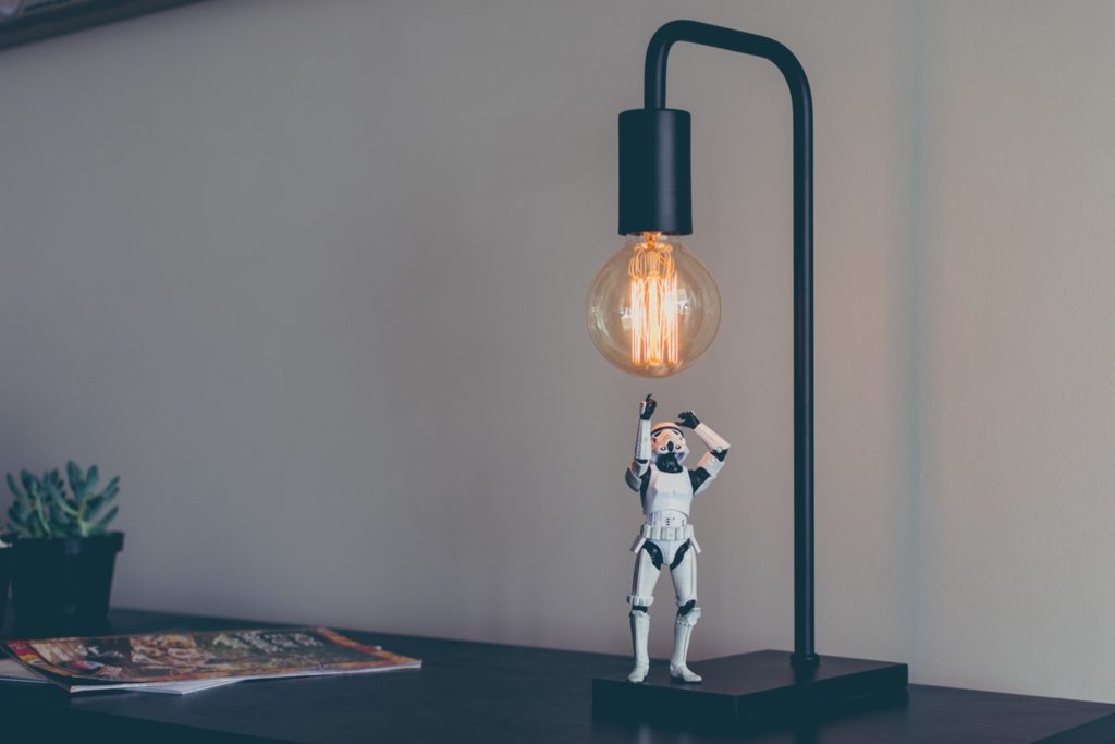 Figure under lamp - Unsplash Moodshot