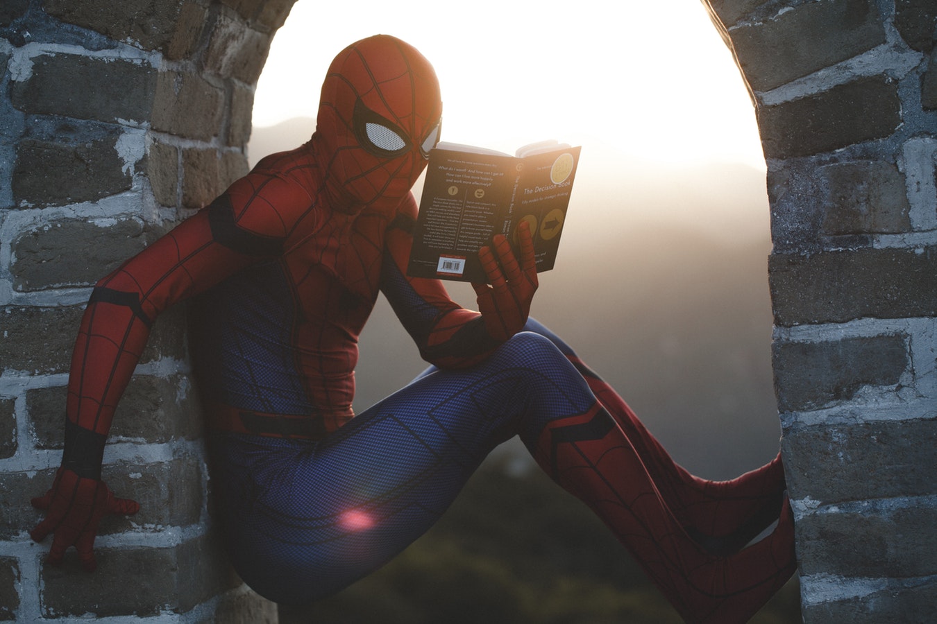 Spider Man with book - Unsplash Moodshot